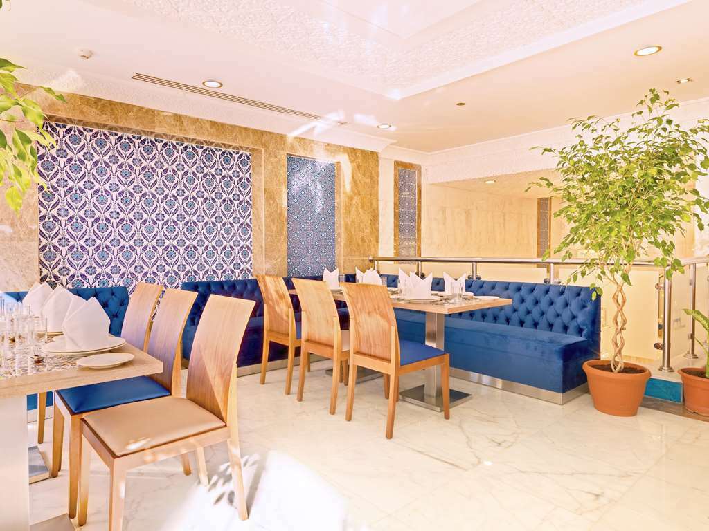Tulip Inn Al Dar Rawafed Medina Restoran foto
